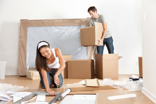 Removal team preparing items safely before a house move