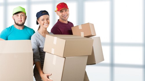 Furniture removal team organising access for a Catford property move