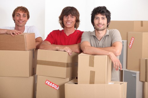 Local removal company team loading furniture for transport in Catford