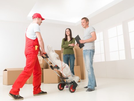 Professional movers loading a van for same day removals